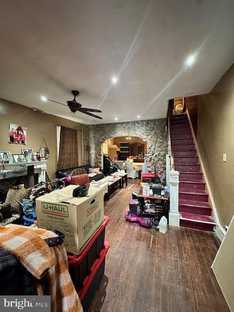 recreation room featuring ceiling fan and hardwood / wood-style floors