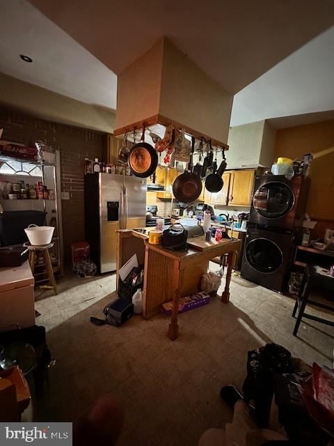 office area featuring stacked washer and dryer