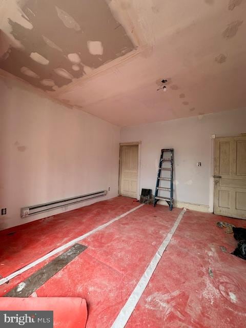 spare room featuring a baseboard radiator