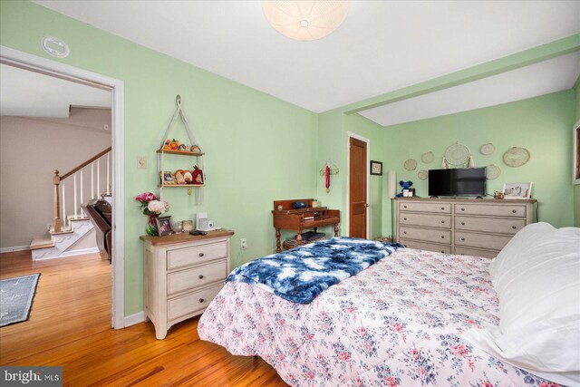 bedroom with light hardwood / wood-style flooring