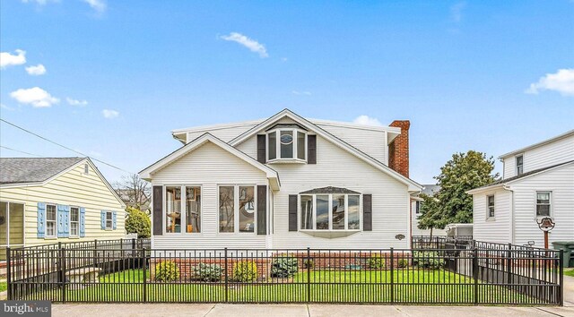 view of front of house with a front yard