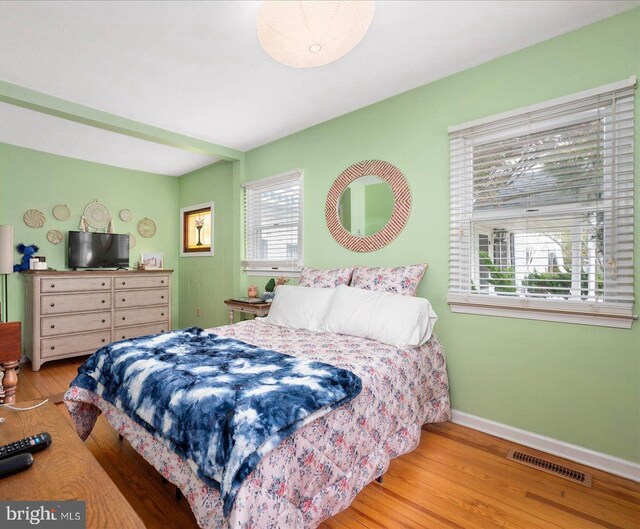 bedroom with light hardwood / wood-style flooring