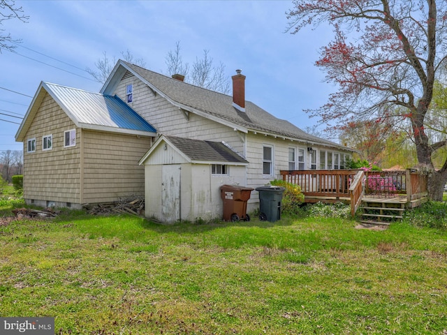 exterior space with a yard and a deck