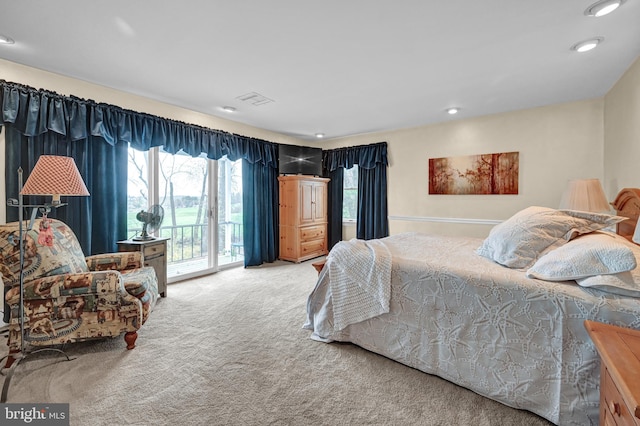 bedroom featuring carpet and access to exterior