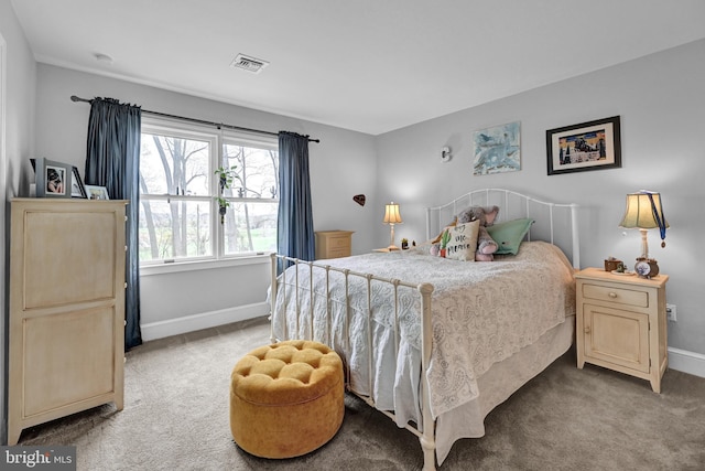 bedroom featuring light carpet