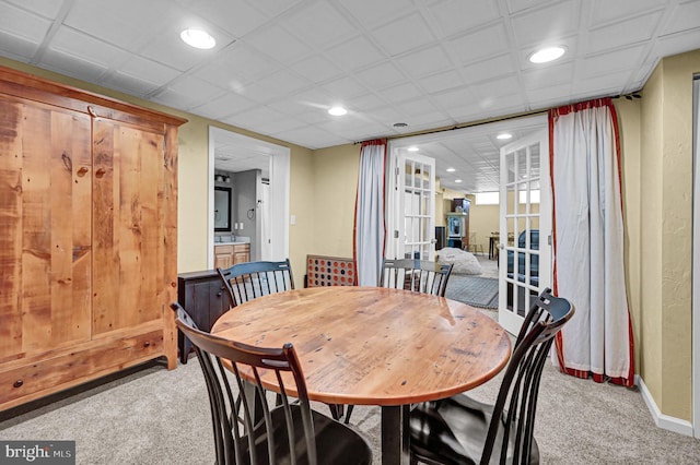 view of carpeted dining area