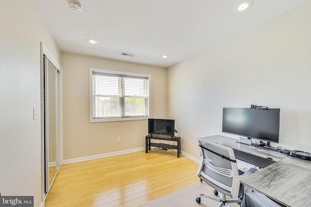 office space featuring light wood-type flooring