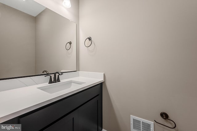 bathroom featuring visible vents and vanity