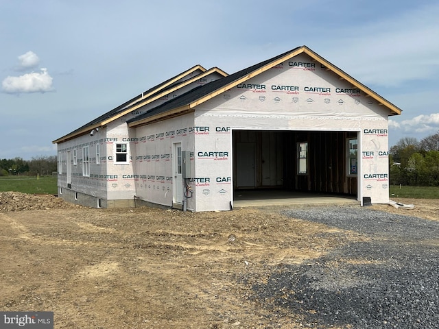 garage featuring driveway