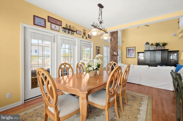 dining space featuring light wood-type flooring