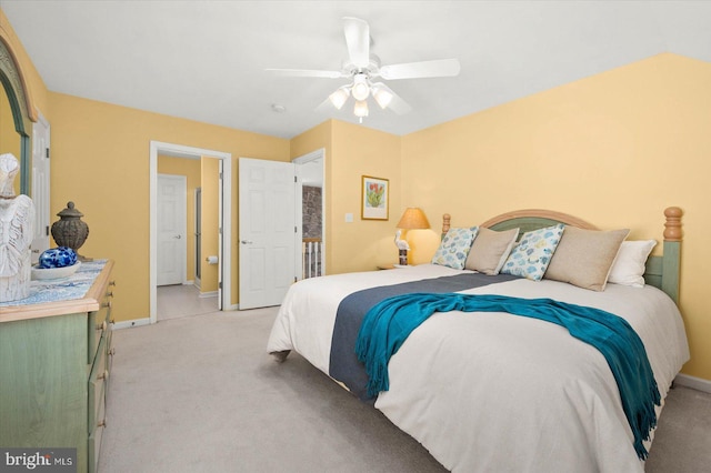 bedroom with light colored carpet and ceiling fan