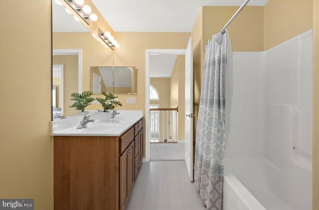 bathroom with tile flooring, vanity, and shower / bath combination with curtain