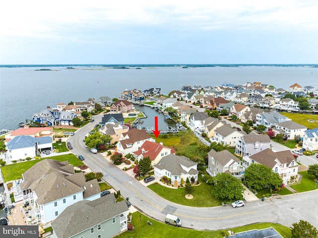 drone / aerial view featuring a water view