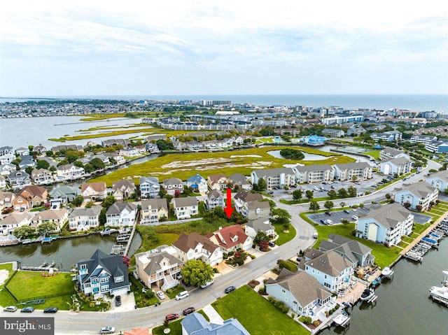 bird's eye view with a water view