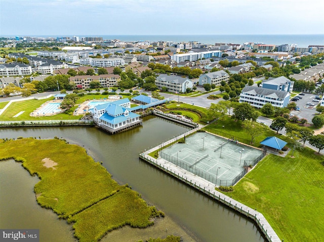 birds eye view of property featuring a water view