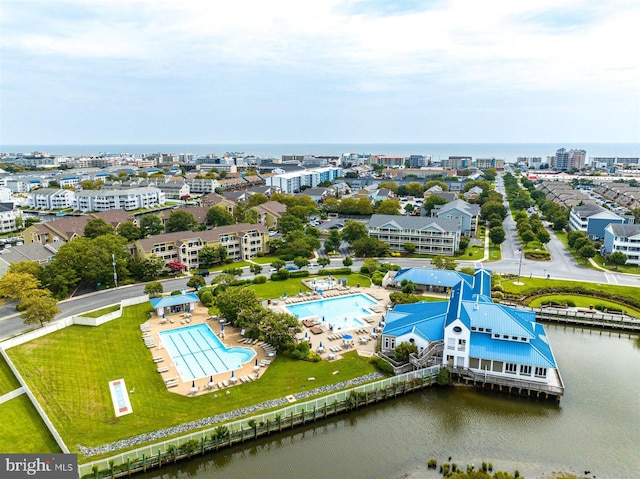 birds eye view of property featuring a water view