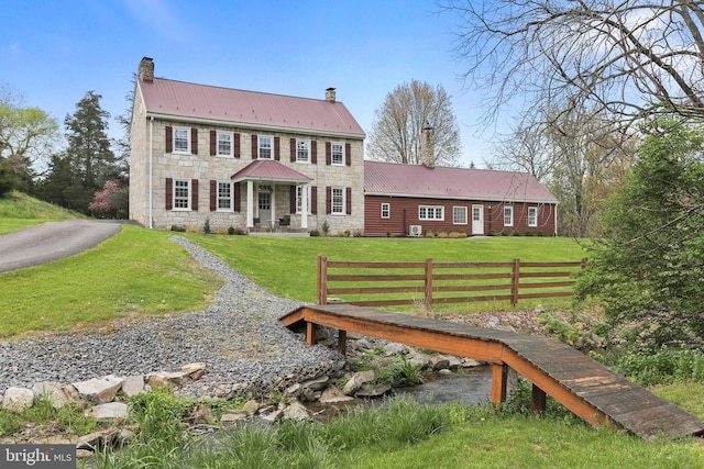 exterior space with a front lawn