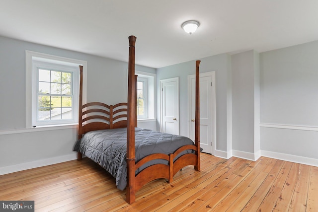 bedroom with light hardwood / wood-style floors