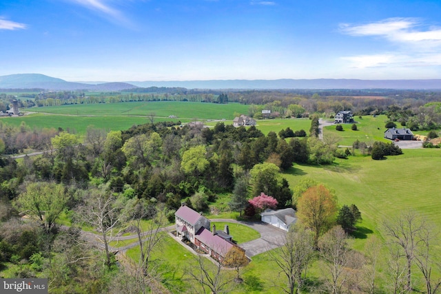 aerial view featuring a mountain view and a rural view