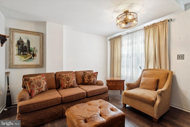 living room with dark hardwood / wood-style floors