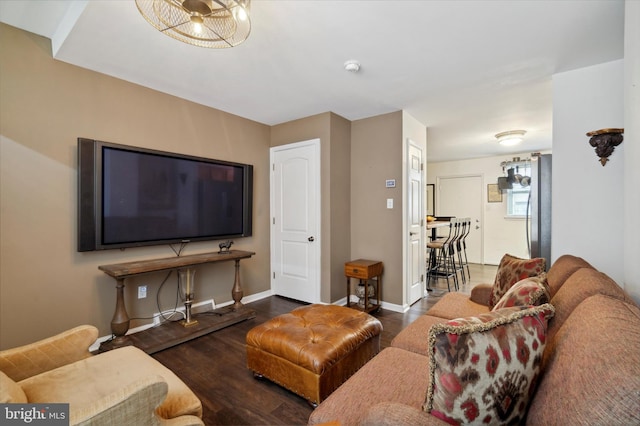 living room featuring dark hardwood / wood-style floors