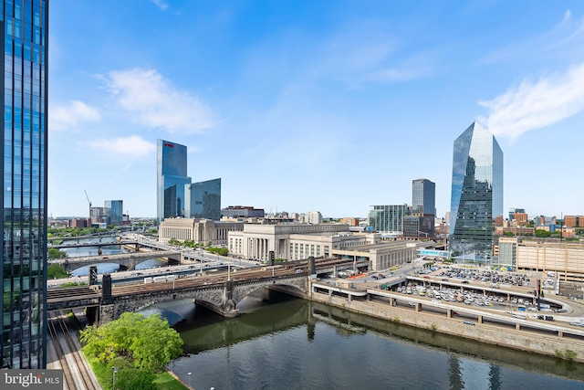 property's view of city featuring a water view