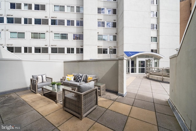 view of terrace featuring an outdoor living space