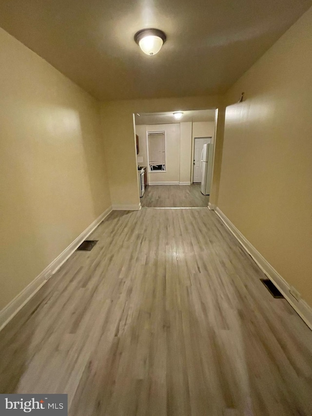 hallway featuring light wood-type flooring