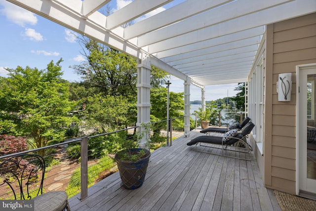 wooden deck with a pergola