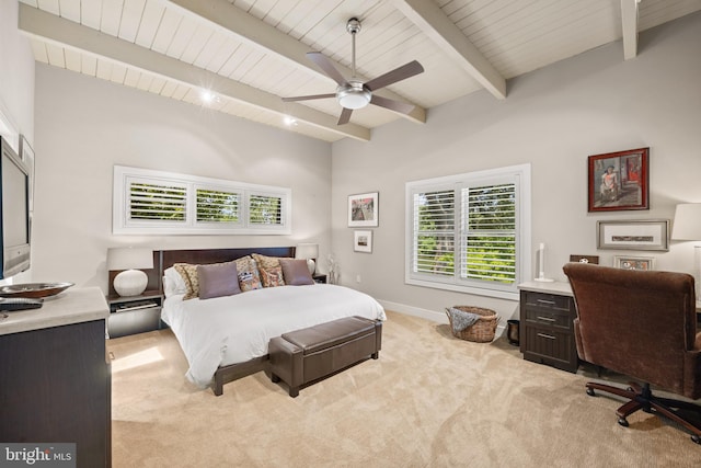 bedroom with light carpet, lofted ceiling with beams, ceiling fan, and wooden ceiling