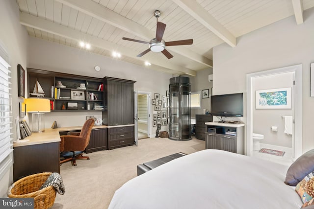 carpeted bedroom with ensuite bath, ceiling fan, beam ceiling, built in desk, and wooden ceiling