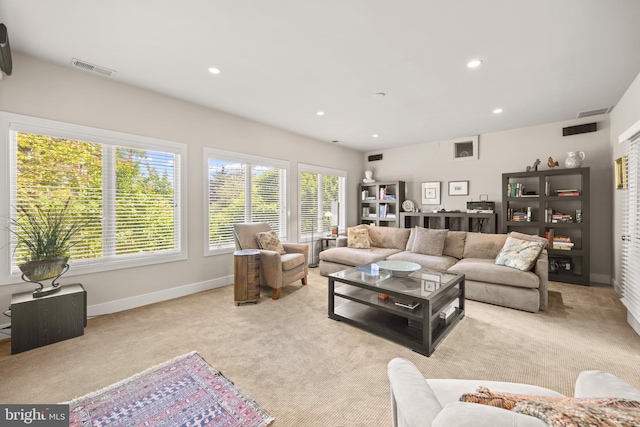 living room with light colored carpet