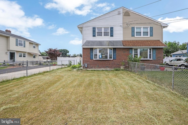 view of front facade with a front yard