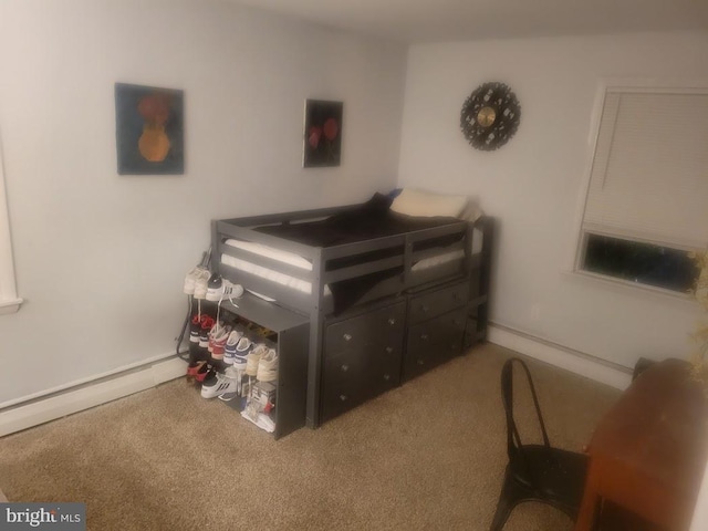 bedroom featuring carpet and baseboard heating