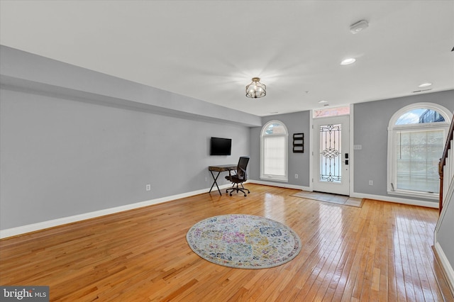 entryway with light hardwood / wood-style floors