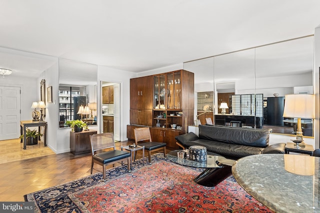 living room with light parquet floors