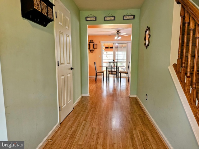 hallway featuring light wood-type flooring