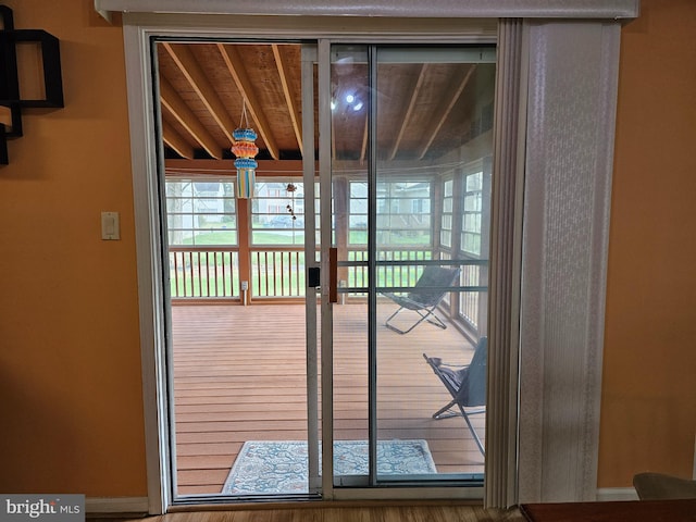 doorway to outside with hardwood / wood-style floors