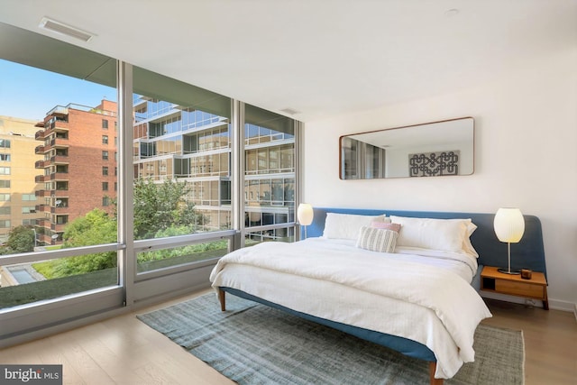 bedroom featuring wood-type flooring