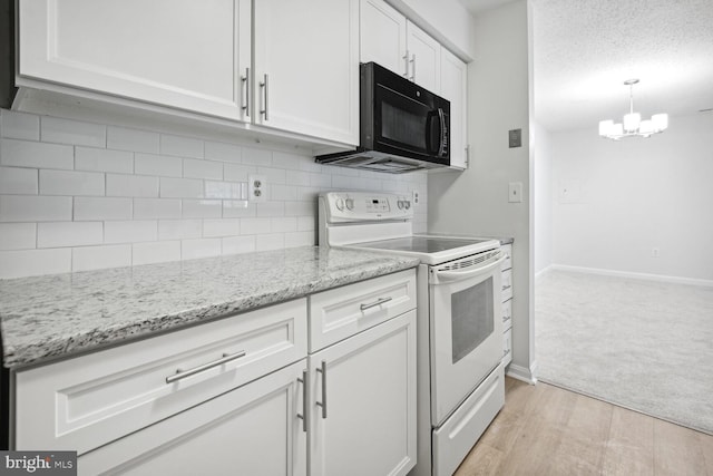 kitchen with tasteful backsplash, white electric range, light stone countertops, and white cabinets