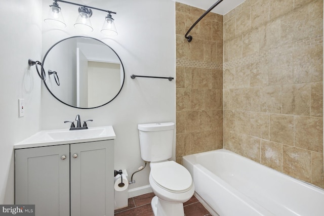 full bathroom with vanity, toilet, and tiled shower / bath combo