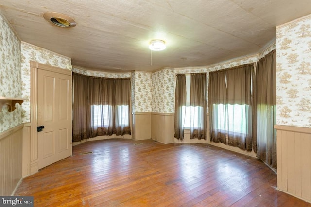 empty room featuring wood-type flooring