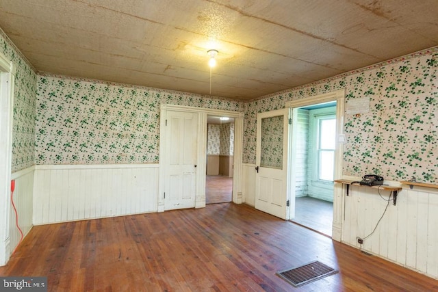 spare room featuring hardwood / wood-style flooring