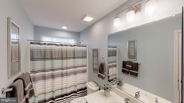 bathroom with sink and toilet