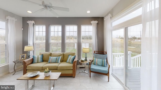 sunroom / solarium with ceiling fan