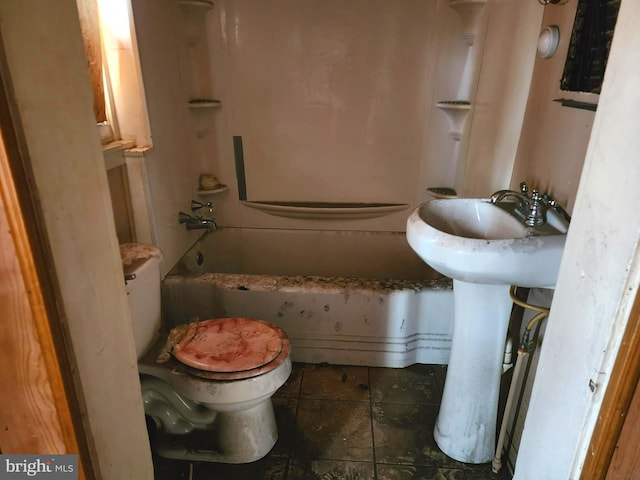 bathroom with tile flooring,  shower combination, and toilet