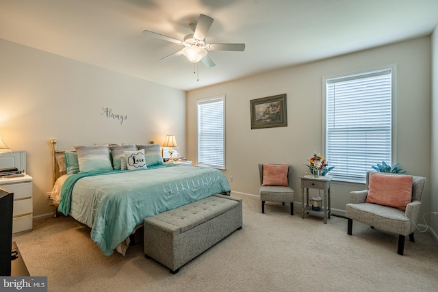 bedroom with light colored carpet and ceiling fan