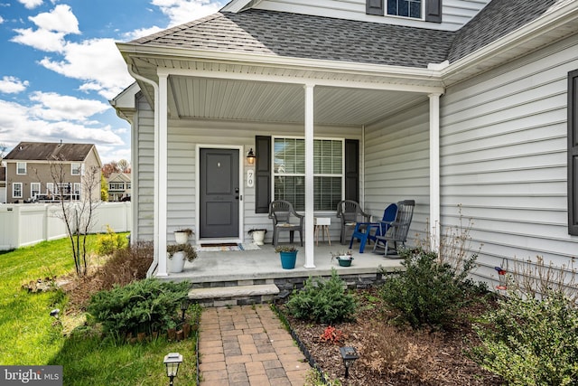 doorway to property featuring covered porch