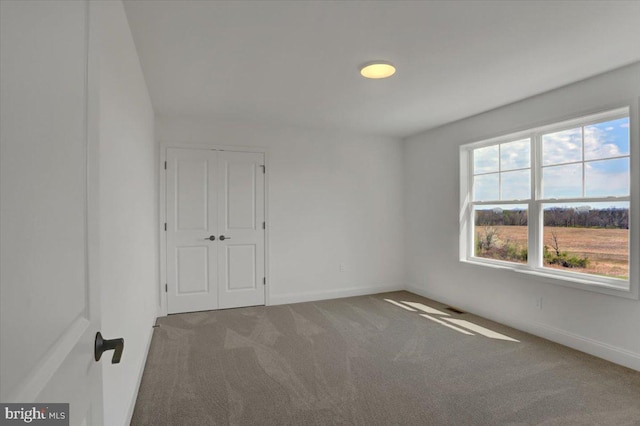 view of carpeted empty room