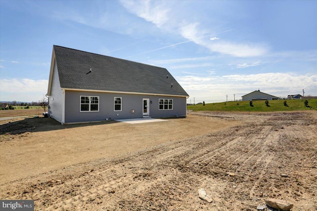 back of property with a patio area